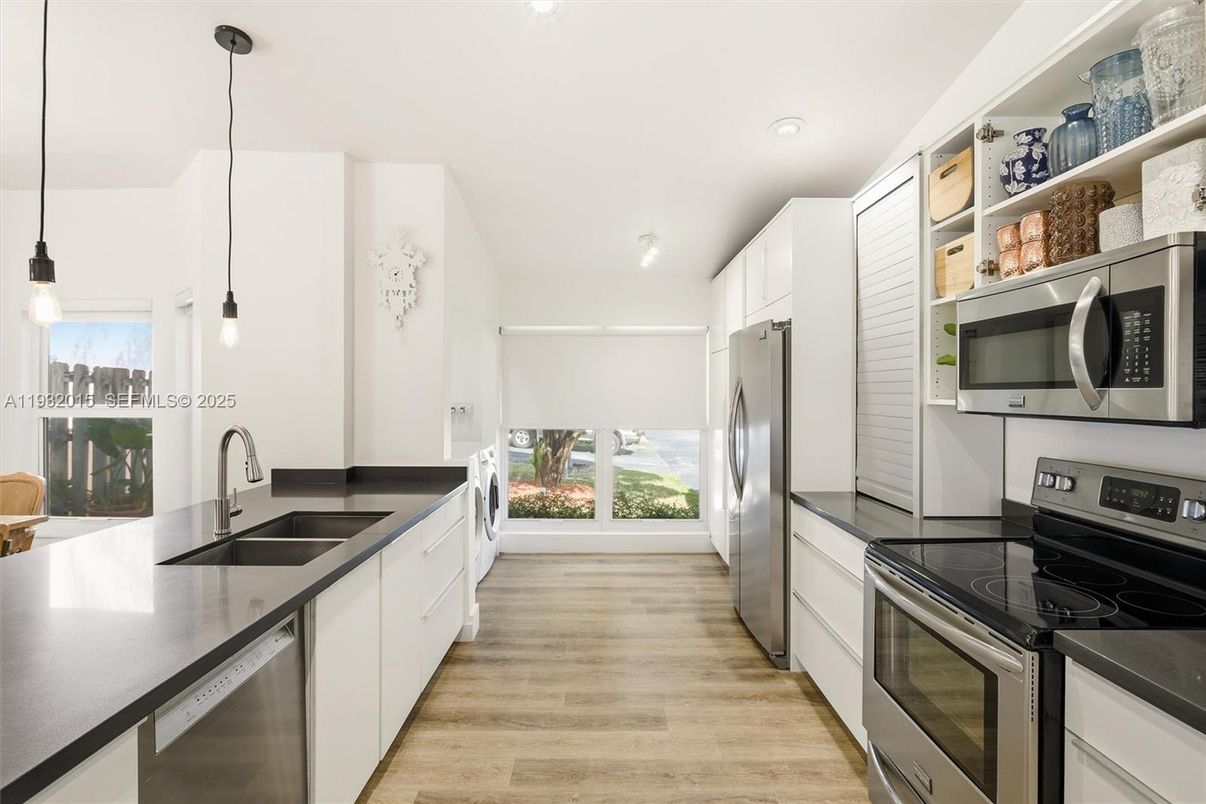 Interior, Kitchen, Pendant Lights, Recessed Lighting, Stainless Steel Appliances, Wood Texture Flooring