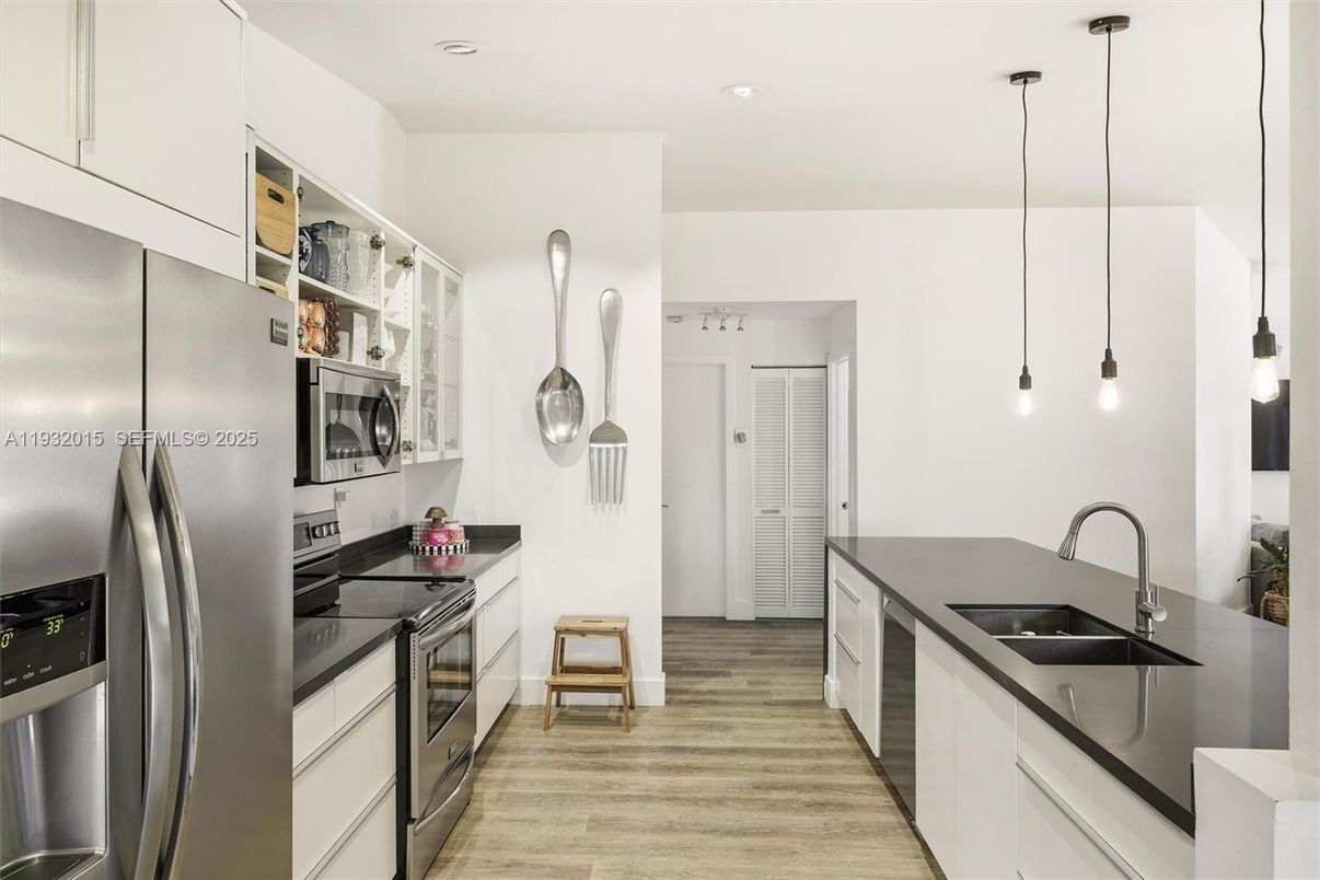 Interior, Kitchen, Pendant Lights, Recessed Lighting, Stainless Steel Appliances, Wood Texture Flooring