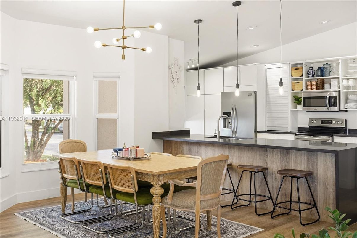 Dining room, Interior, Kitchen, Pendant Lights, Recessed Lighting, Stainless Steel Appliances, Wood Texture Flooring