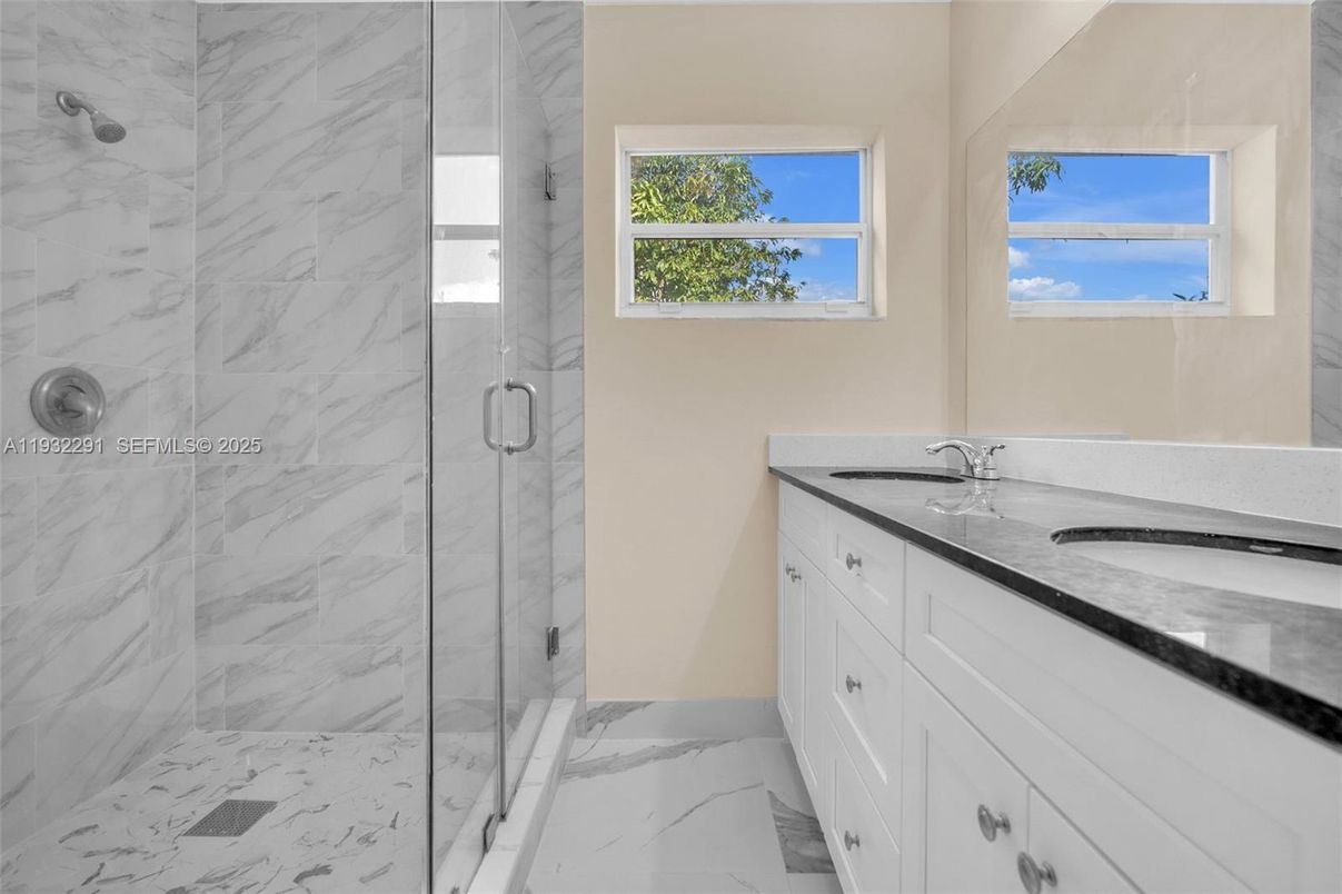 Bathroom, Dual Sink Vanities, Glass Shower, Interior, Marble, Marble Walls