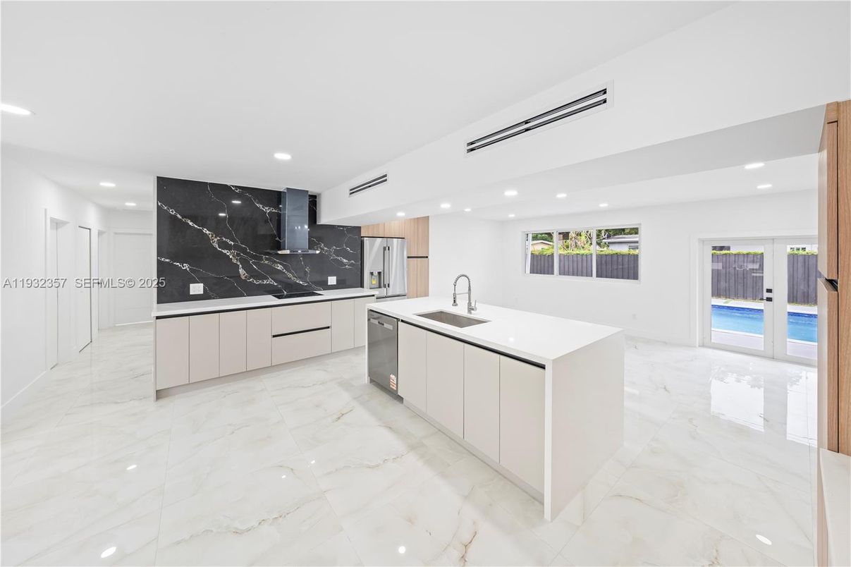 Interior, Kitchen, Marble, Marble Walls, Recessed Lighting, Stainless Steel Appliances