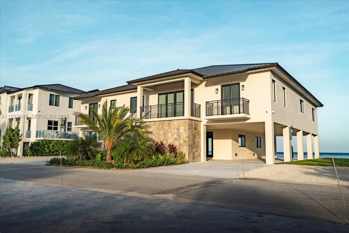 Exterior, Facade, Water, Modern