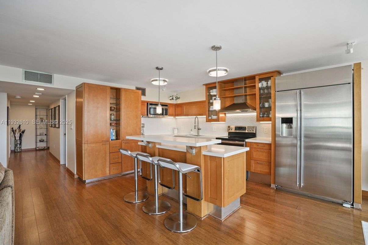 Interior, Kitchen, Pendant Lights, Recessed Lighting, Stainless Steel Appliances, Wood Texture Flooring