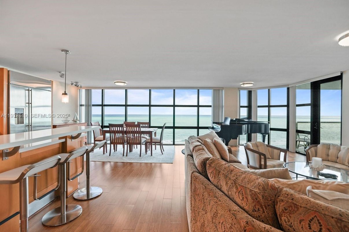 Dining room, Interior, Living room, Pendant Lights, Piano, Water, Wood Texture Flooring