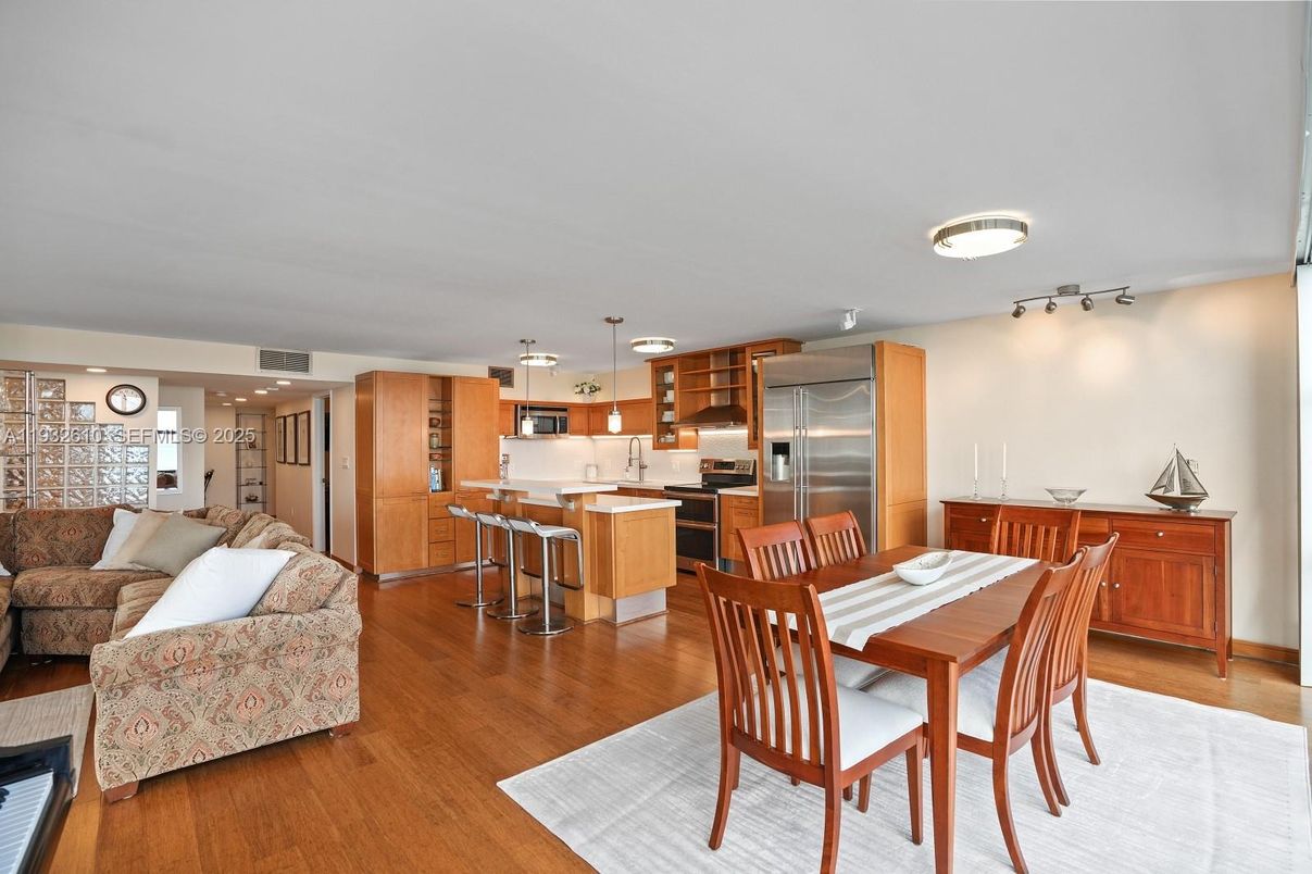 Dining room, Interior, Kitchen, Living room, Pendant Lights, Recessed Lighting, Stainless Steel Appliances, Wood Texture Flooring