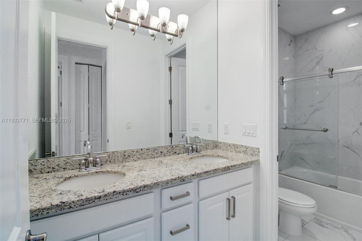 Bathroom, Dual Sink Vanities, Interior, Marble, Marble Walls, Recessed Lighting