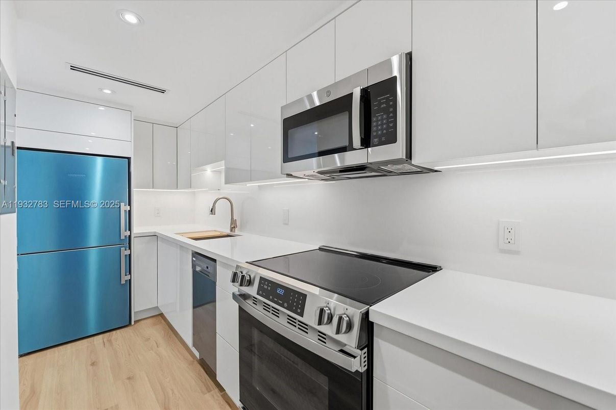 Interior, Kitchen, Recessed Lighting, Stainless Steel Appliances, Wood Texture Flooring