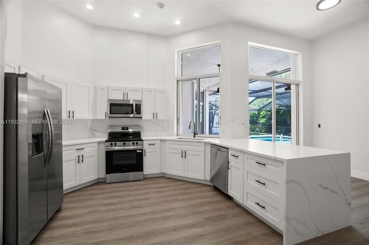 Interior, Kitchen, Recessed Lighting, Stainless Steel Appliances, Wood Texture Flooring