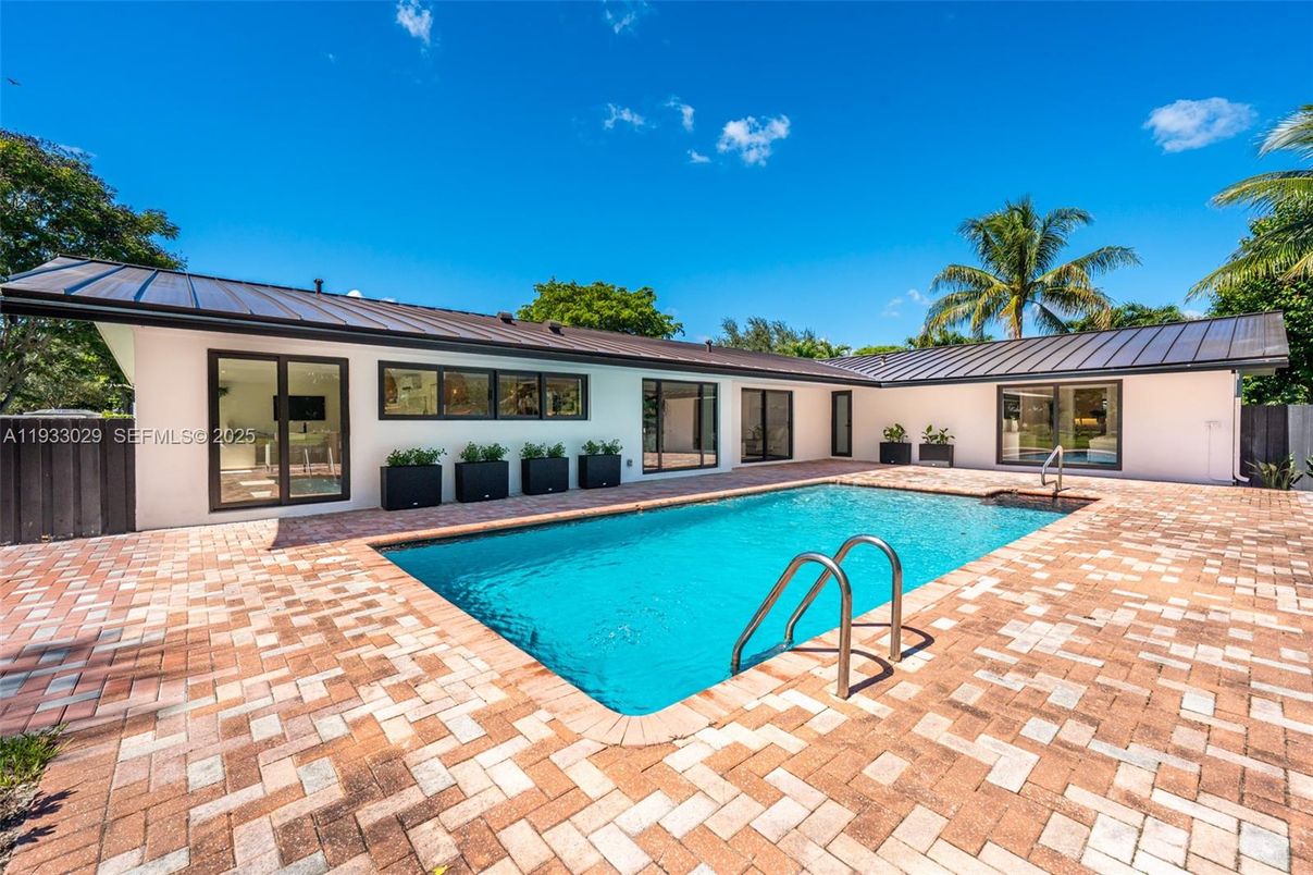 Exterior, Pool, Solar Panels