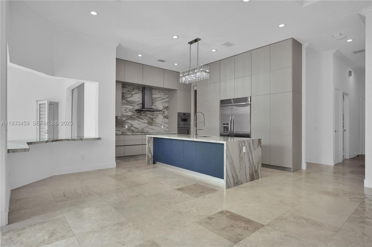 Chandelier, Interior, Kitchen, Marble Walls, Pendant Lights, Recessed Lighting, Stainless Steel Appliances