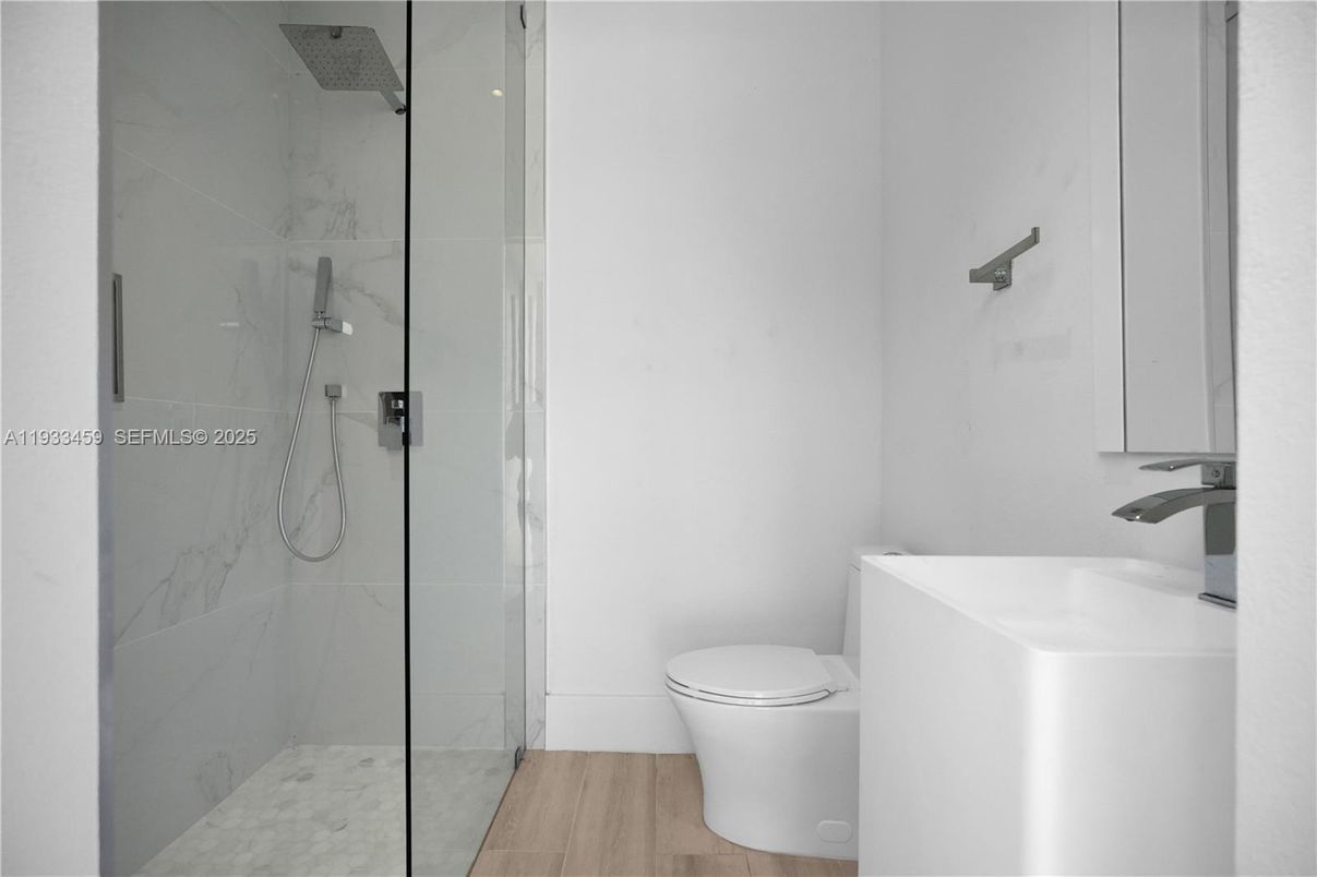 Bathroom, Glass Shower, Interior, Marble Walls, Wood Texture Flooring