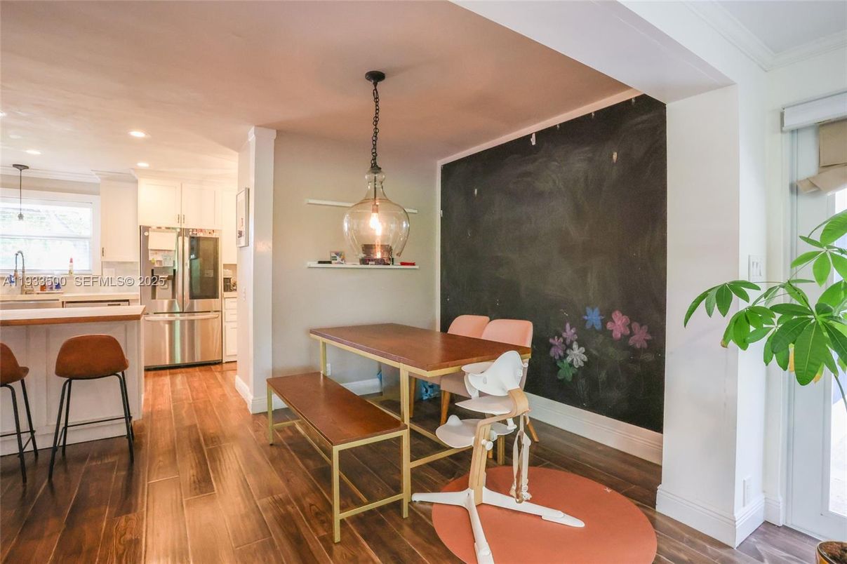 Dining room, Interior, Kitchen, Pendant Lights, Recessed Lighting, Stainless Steel Appliances, Wood Texture Flooring