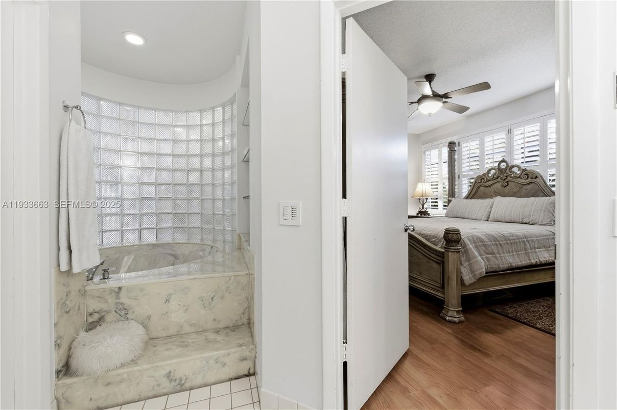 Bathroom, Bedroom, Glass Shower, Interior, Recessed Lighting, Wood Texture Flooring