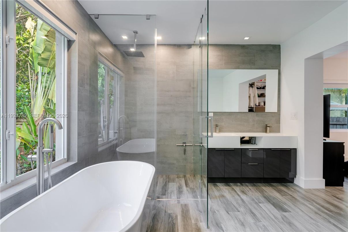 Bathroom, Dual Sink Vanities, Free Standing Baths, Glass Shower, Interior, Recessed Lighting, Wood Texture Flooring