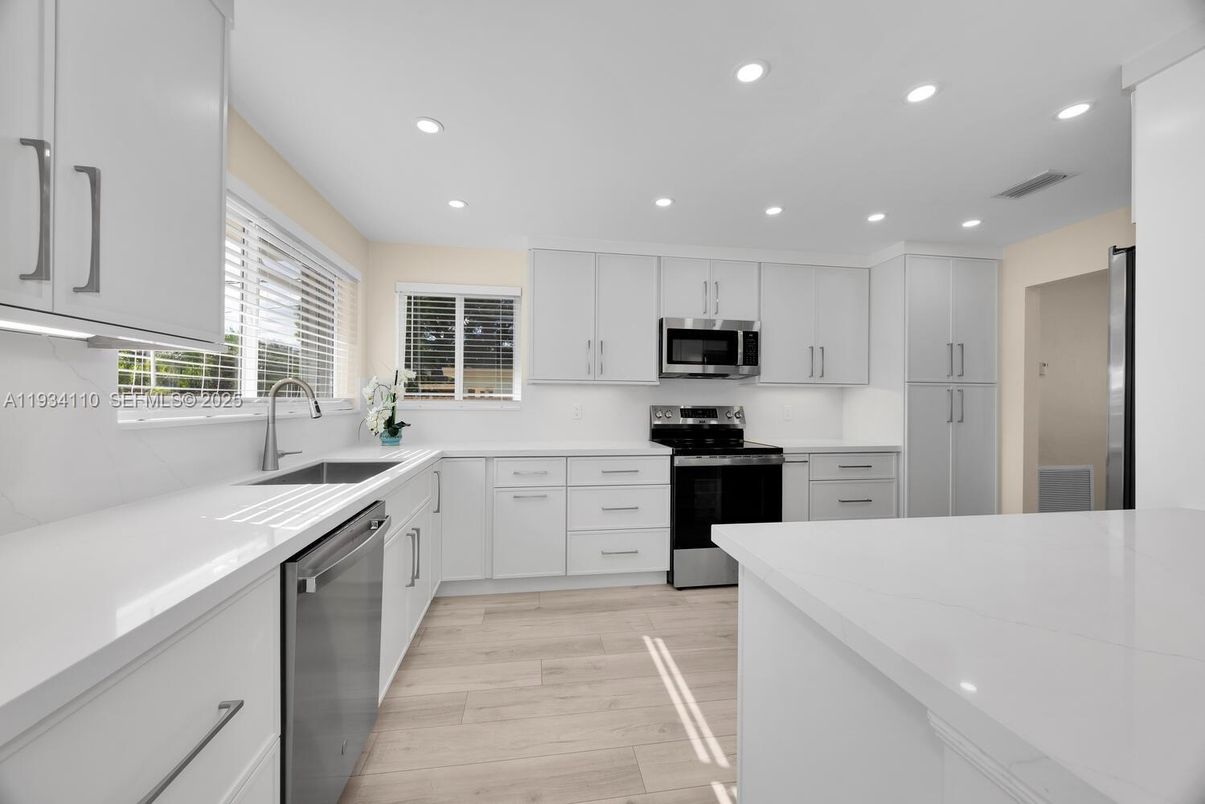 Interior, Kitchen, Recessed Lighting, Stainless Steel Appliances, Wood Texture Flooring