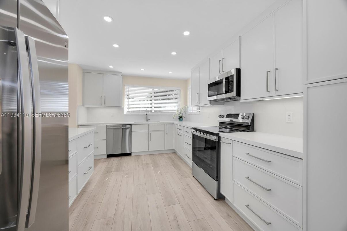 Interior, Kitchen, Recessed Lighting, Stainless Steel Appliances, Wood Texture Flooring