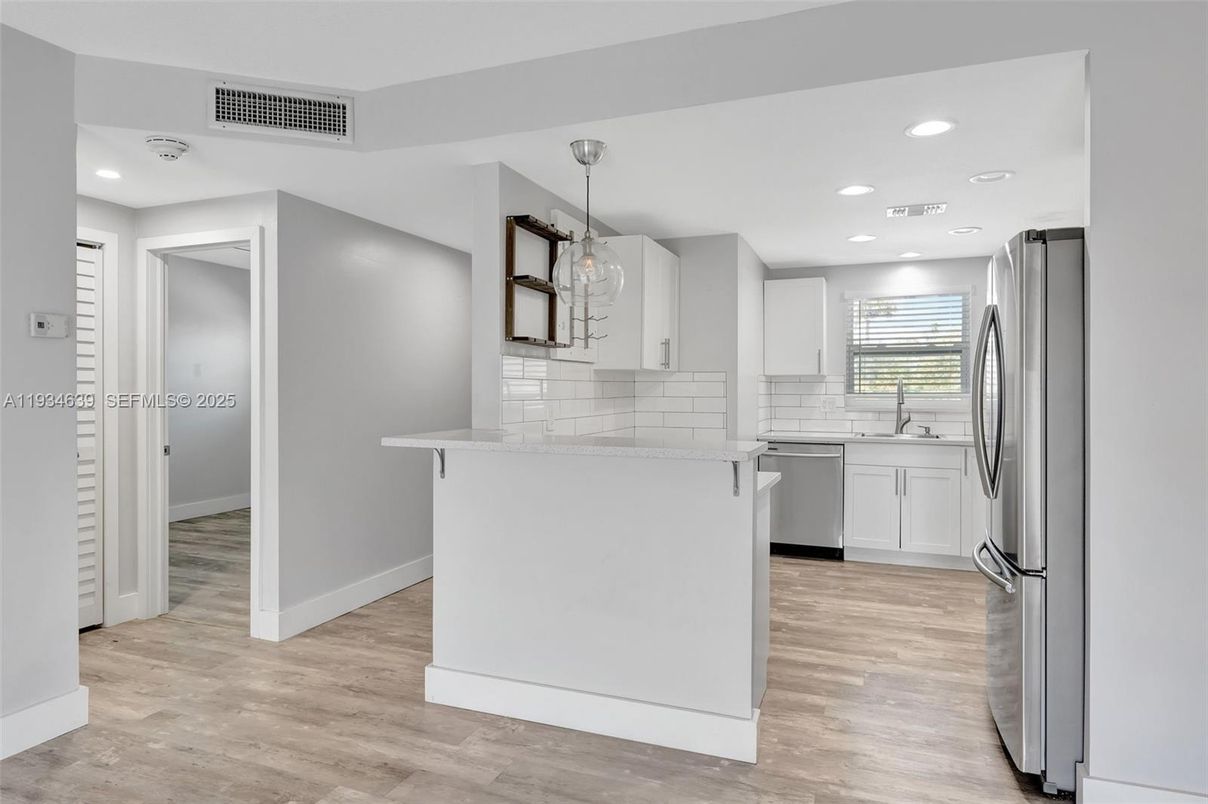 Interior, Kitchen, Pendant Lights, Recessed Lighting, Stainless Steel Appliances, Wood Texture Flooring