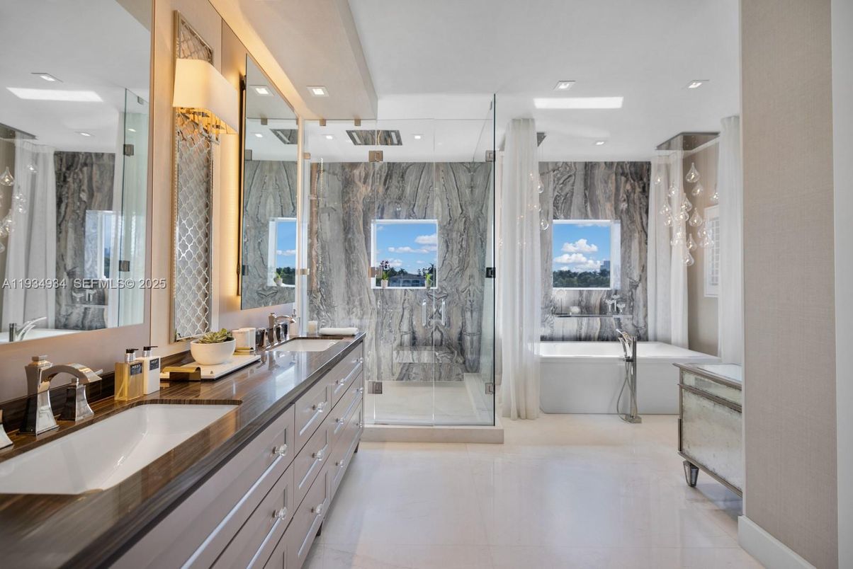 Bathroom, Dual Sink Vanities, Free Standing Baths, Glass Shower, Interior, Marble Walls, Recessed Lighting