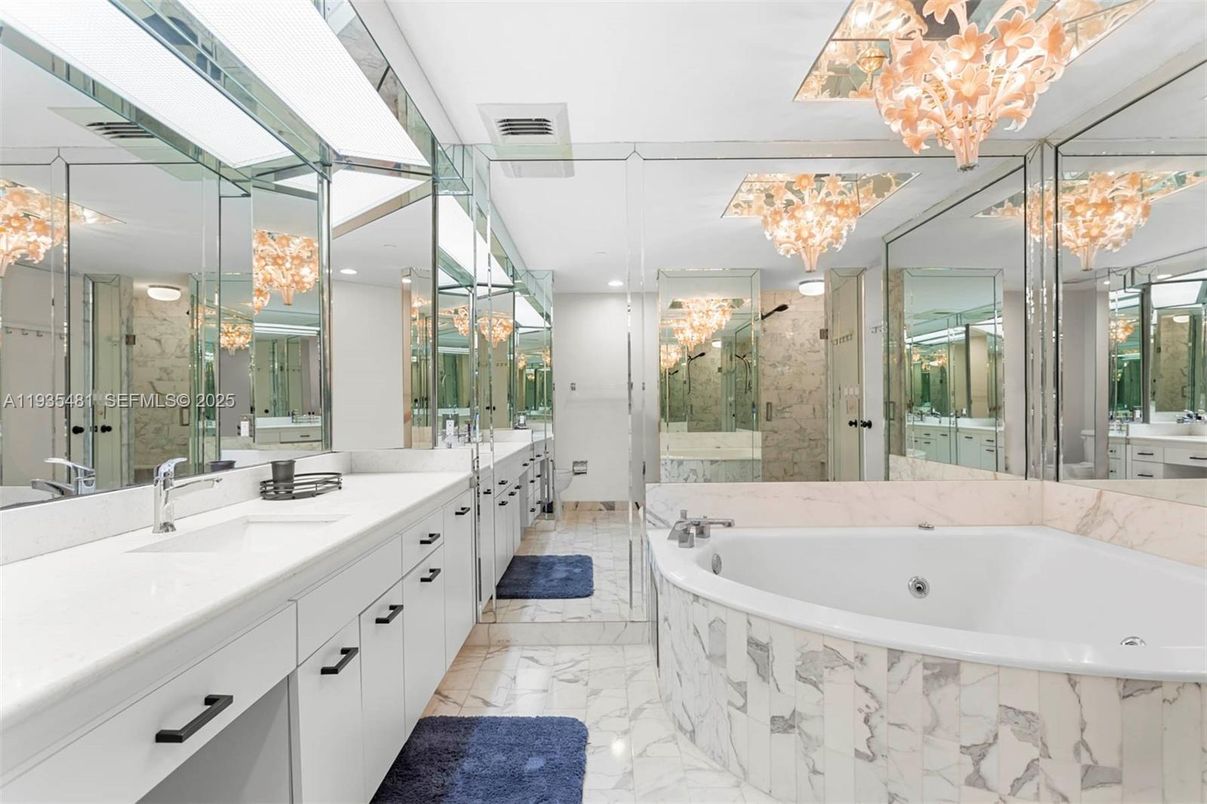 Bathroom, Dual Sink Vanities, Glass Shower, Interior, Marble, Marble Walls, Recessed Lighting