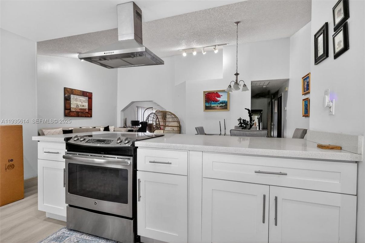 Dining room, Interior, Kitchen, Pendant Lights, Stainless Steel Appliances, Wood Texture Flooring