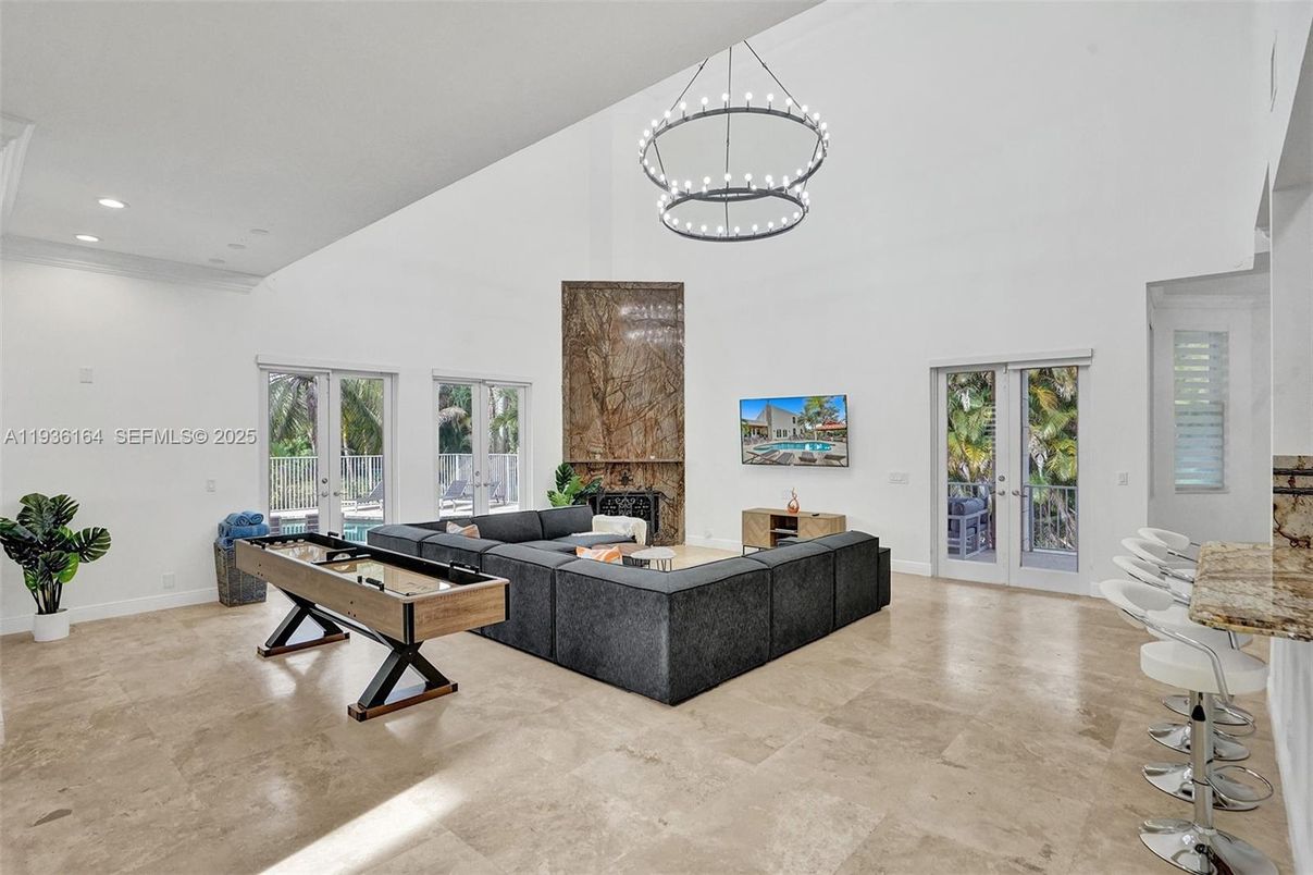 Fireplace, Game Room, Interior, Living room, Pendant Lights, Recessed Lighting