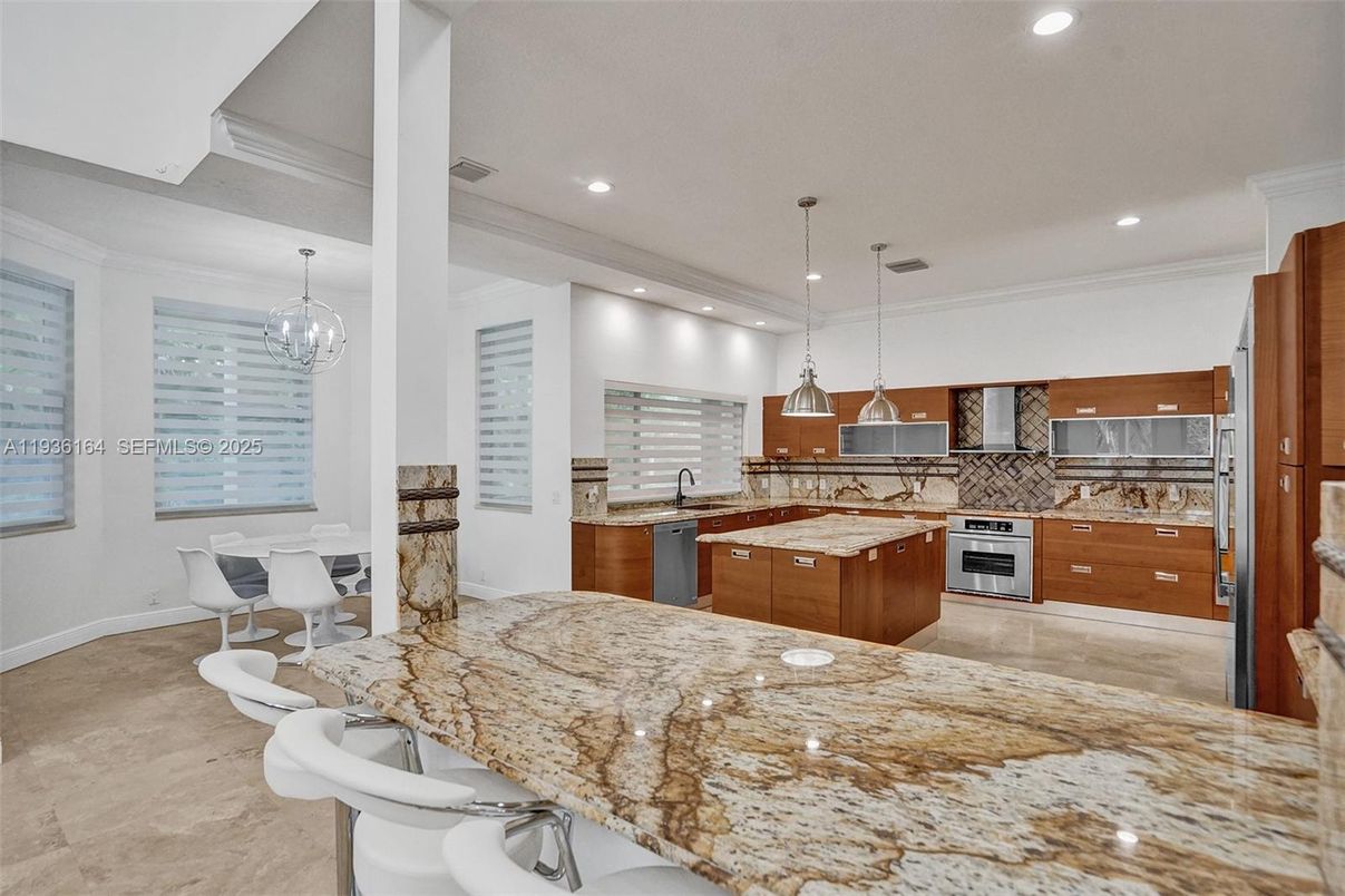 Chandelier, Dining room, Interior, Kitchen, Pendant Lights, Recessed Lighting, Stainless Steel Appliances