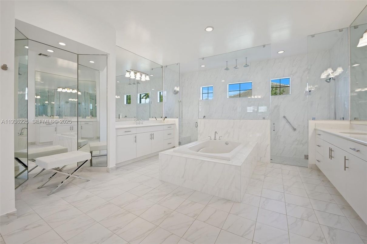 Bathroom, Dual Sink Vanities, Glass Shower, Interior, Marble, Marble Walls, Recessed Lighting