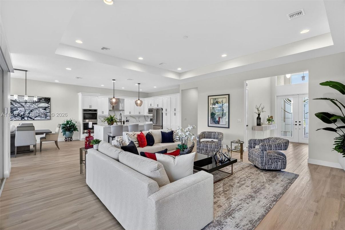 Dining room, Interior, Kitchen, Living room, Pendant Lights, Recessed Lighting, Stainless Steel Appliances, Wood Texture Flooring