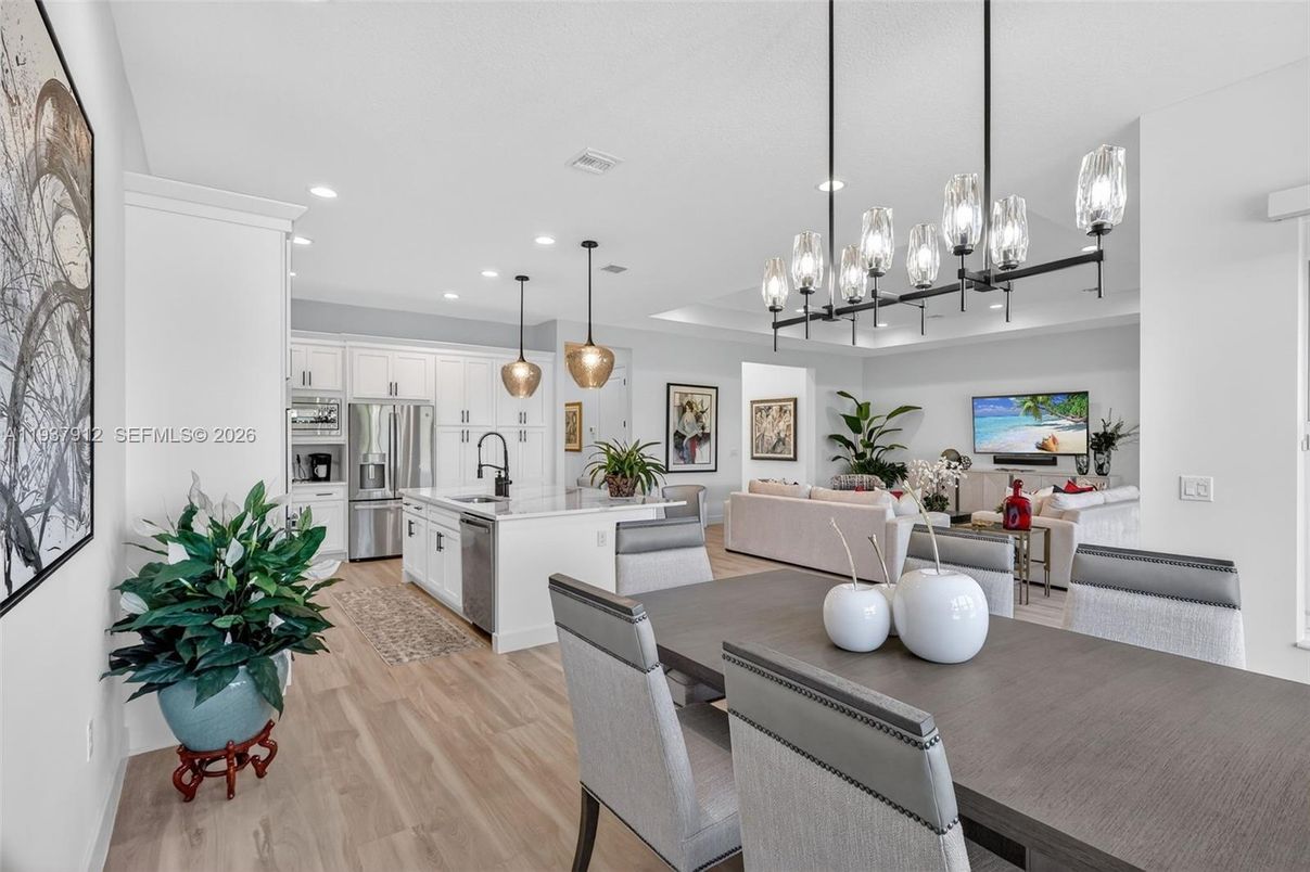 Dining room, Interior, Kitchen, Living room, Pendant Lights, Recessed Lighting, Stainless Steel Appliances, Wood Texture Flooring