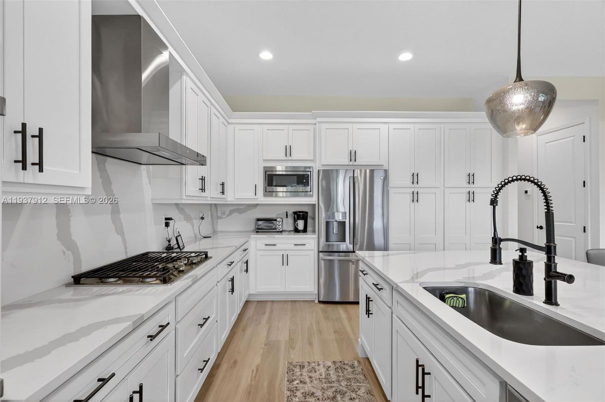 Interior, Kitchen, Pendant Lights, Recessed Lighting, Stainless Steel Appliances, Wood Texture Flooring