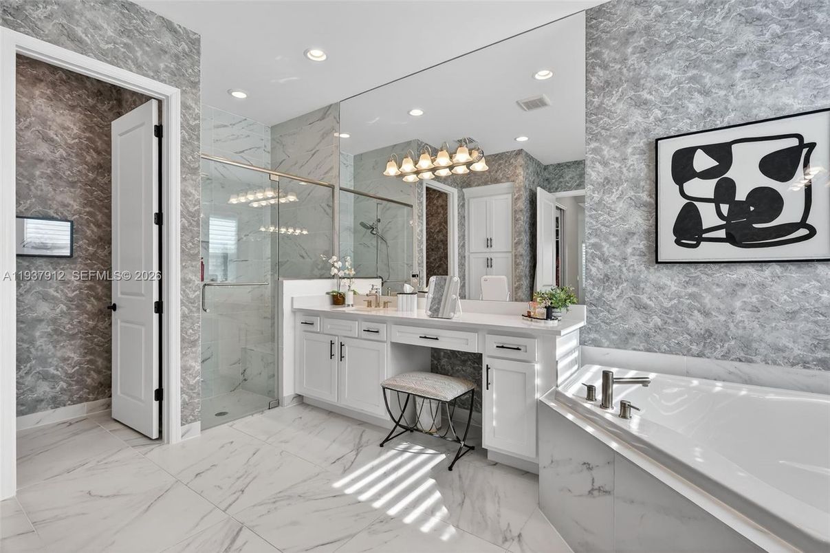 Bathroom, Dual Sink Vanities, Glass Shower, Interior, Marble, Marble Walls, Recessed Lighting