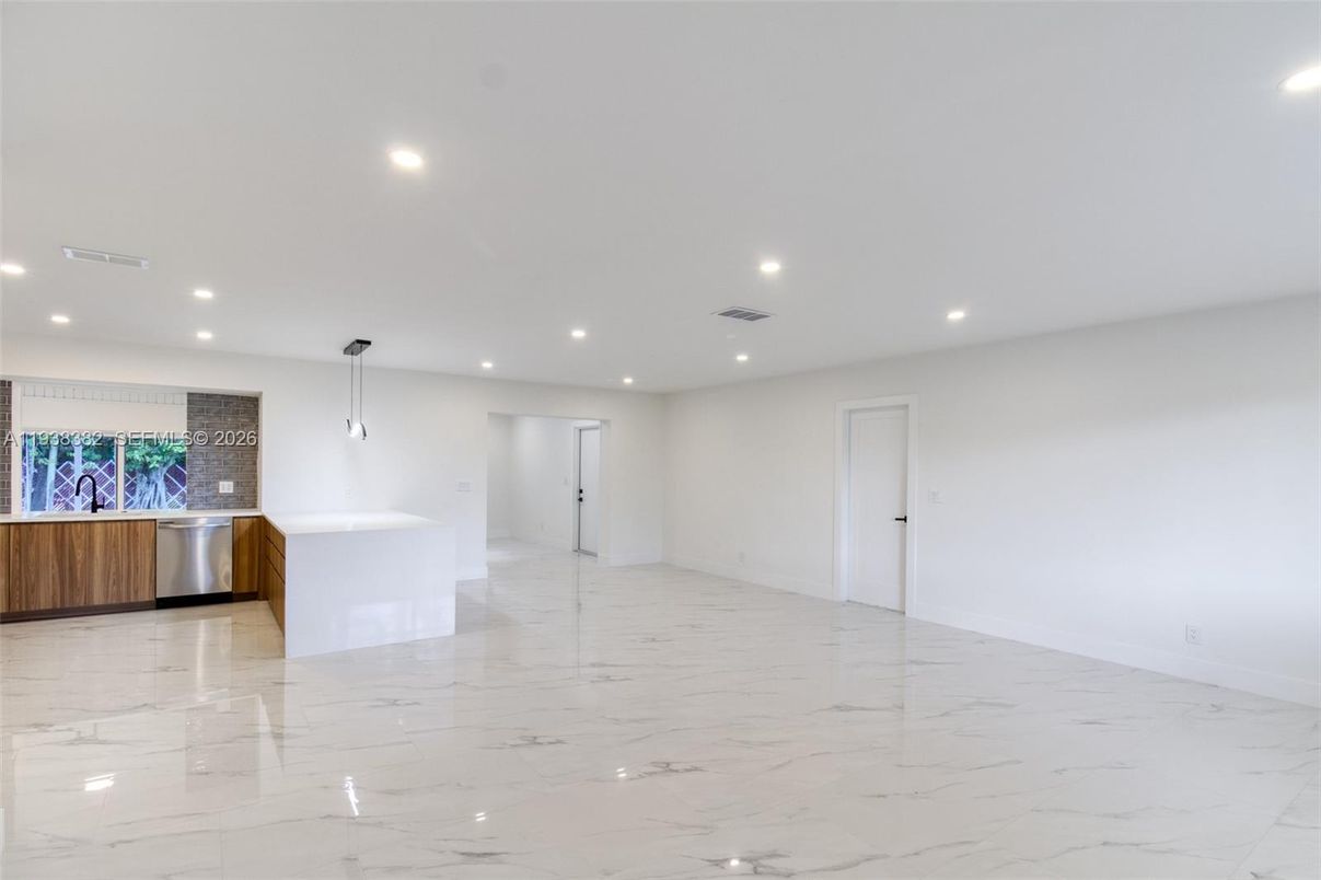 Empty room, Interior, Kitchen, Marble, Pendant Lights, Recessed Lighting, Stainless Steel Appliances