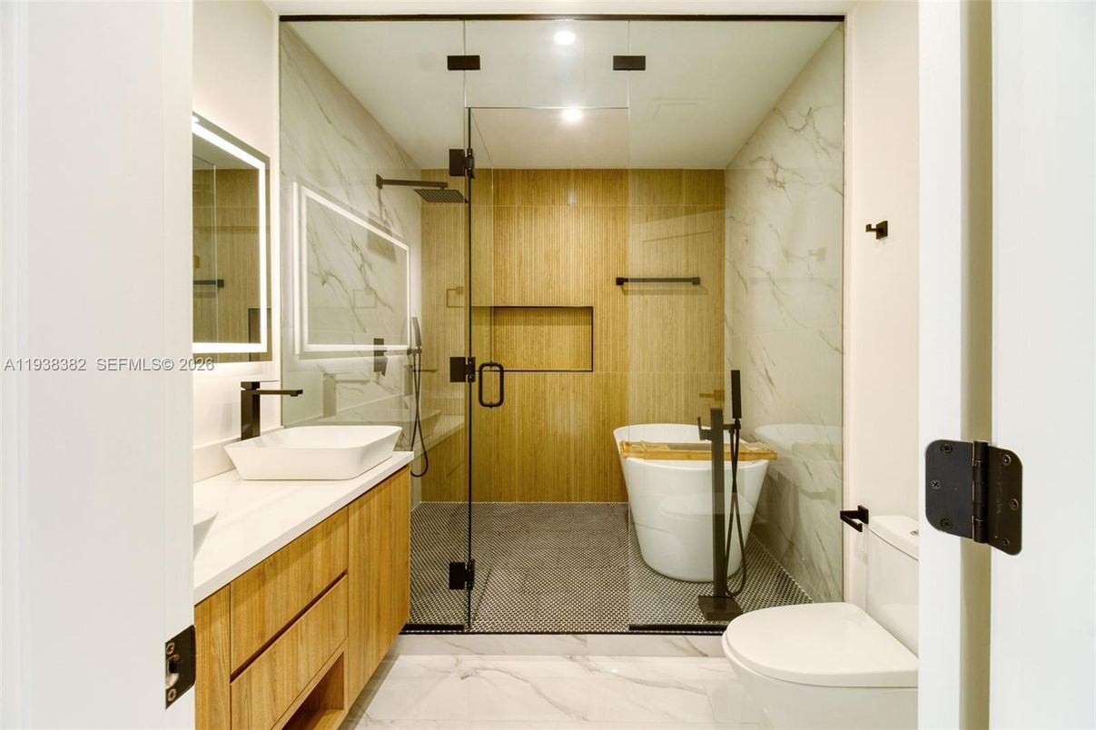 Bathroom, Free Standing Baths, Glass Shower, Interior, Marble, Marble Walls, Recessed Lighting