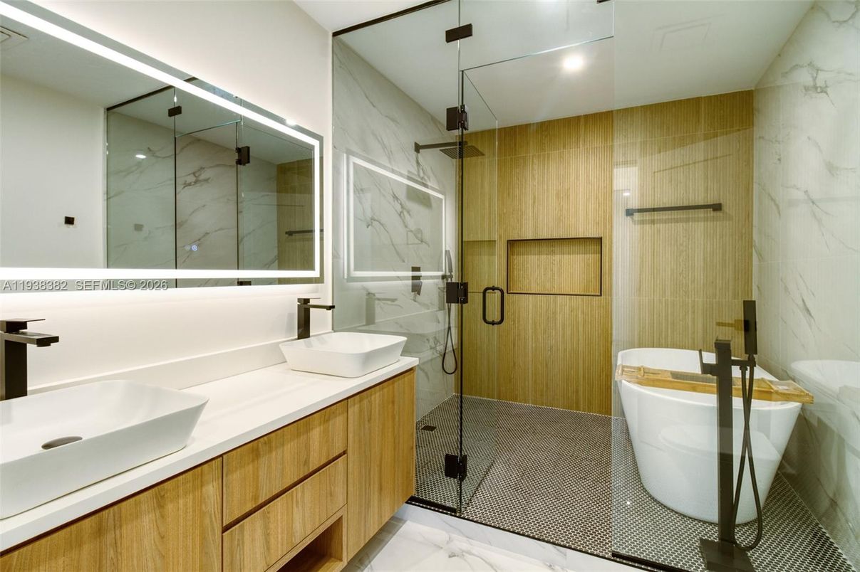 Bathroom, Dual Sink Vanities, Free Standing Baths, Glass Shower, Interior, Marble, Marble Walls, Recessed Lighting