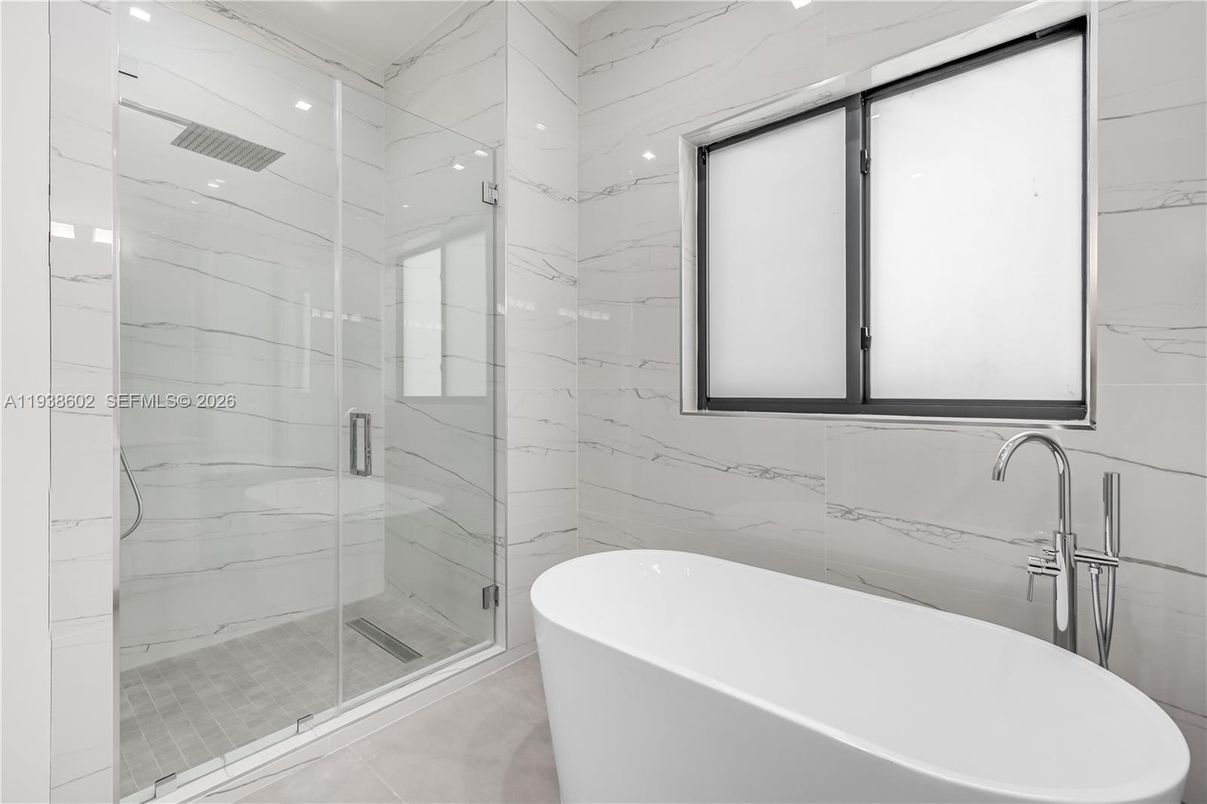 Bathroom, Free Standing Baths, Glass Shower, Interior, Marble Walls, Recessed Lighting