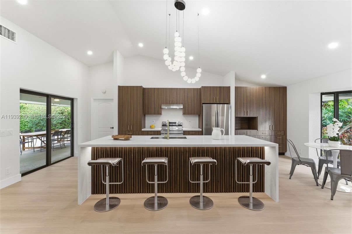 Dining room, Interior, Kitchen, Pendant Lights, Recessed Lighting, Stainless Steel Appliances, Wood Texture Flooring