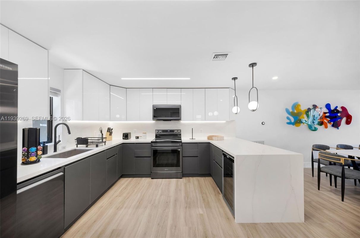 Interior, Kitchen, Pendant Lights, Recessed Lighting, Stainless Steel Appliances, Wood Texture Flooring