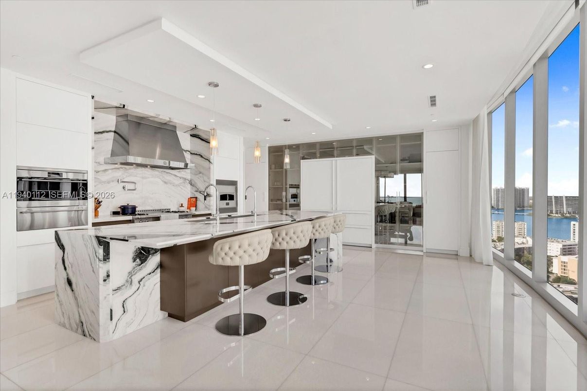 Interior, Kitchen, Marble Walls, Pendant Lights, Recessed Lighting, Stainless Steel Appliances, Water