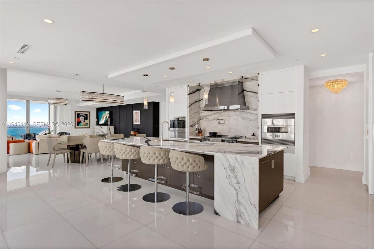 Dining room, Interior, Kitchen, Marble Walls, Pendant Lights, Recessed Lighting, Stainless Steel Appliances, Water