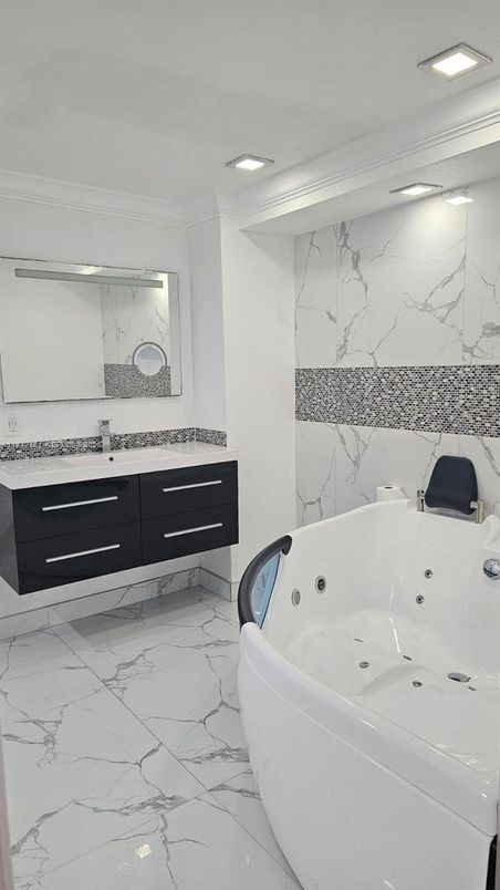 Bathroom, Dual Sink Vanities, Free Standing Baths, Interior, Marble, Marble Walls, Recessed Lighting