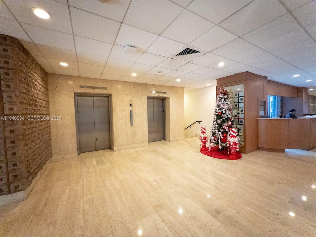 Elevator, Interior, Recessed Lighting, Stone Walls, Wood Texture Flooring, Wooden Walls