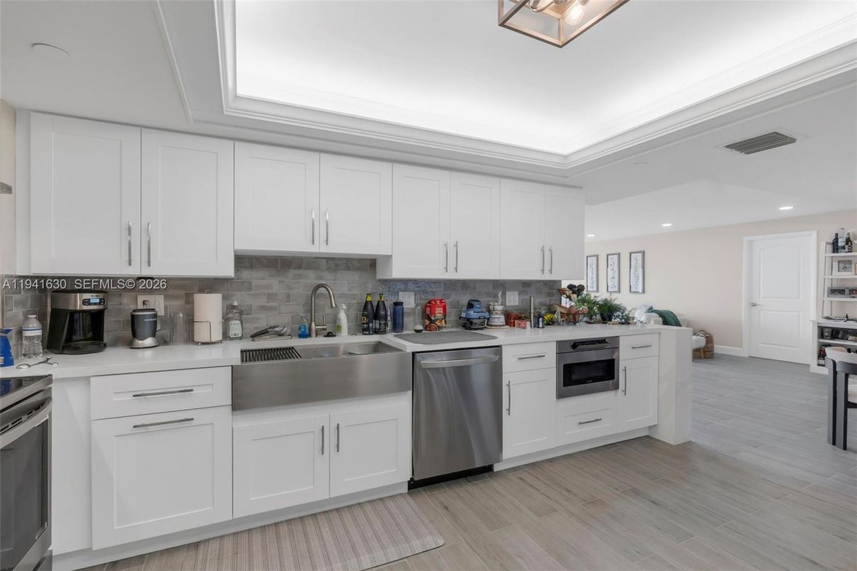 Interior, Kitchen, Recessed Lighting, Stainless Steel Appliances, Wood Texture Flooring