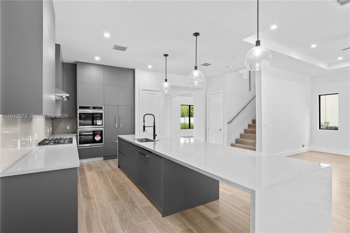 Interior, Kitchen, Pendant Lights, Recessed Lighting, Stainless Steel Appliances, Wood Texture Flooring