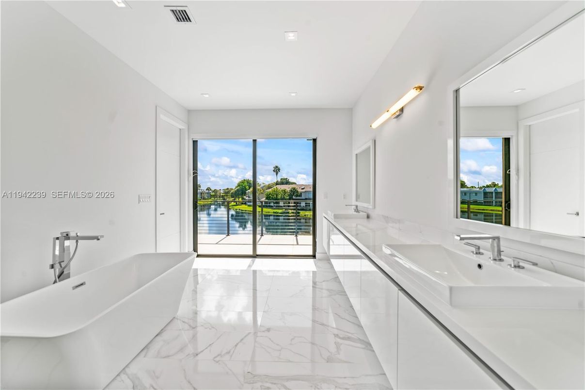 Bathroom, Dual Sink Vanities, Free Standing Baths, Interior, Marble, Recessed Lighting, Water