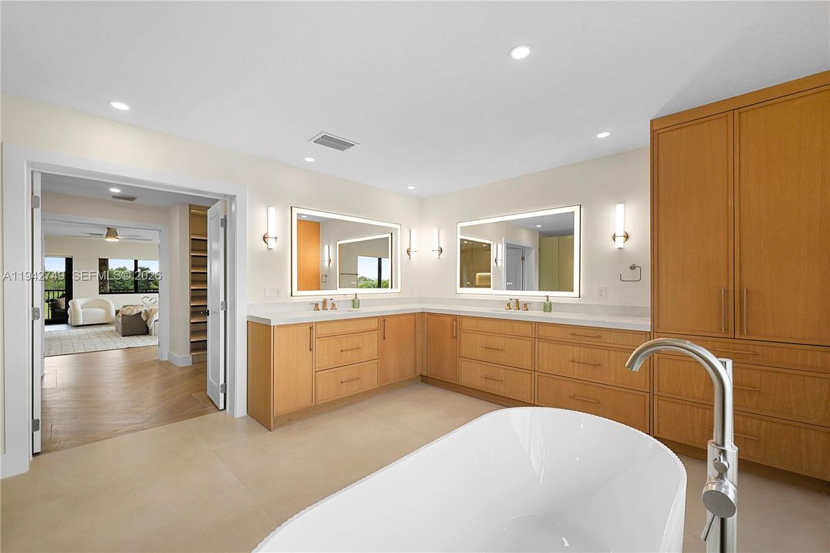 Bathroom, Dual Sink Vanities, Free Standing Baths, Interior, Recessed Lighting, Wood Texture Flooring