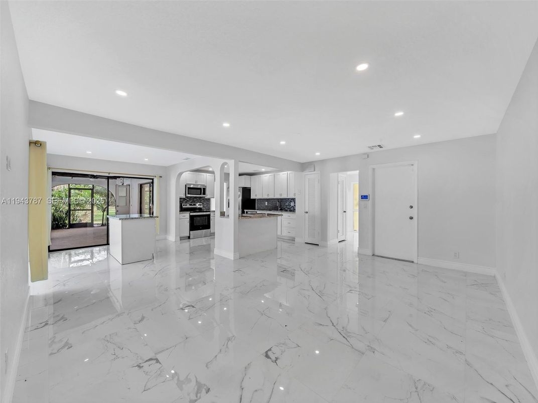 Empty room, Interior, Kitchen, Marble, Recessed Lighting, Stainless Steel Appliances