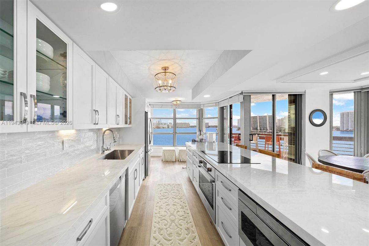Chandelier, Interior, Kitchen, Recessed Lighting, Stainless Steel Appliances, Water, Wood Texture Flooring