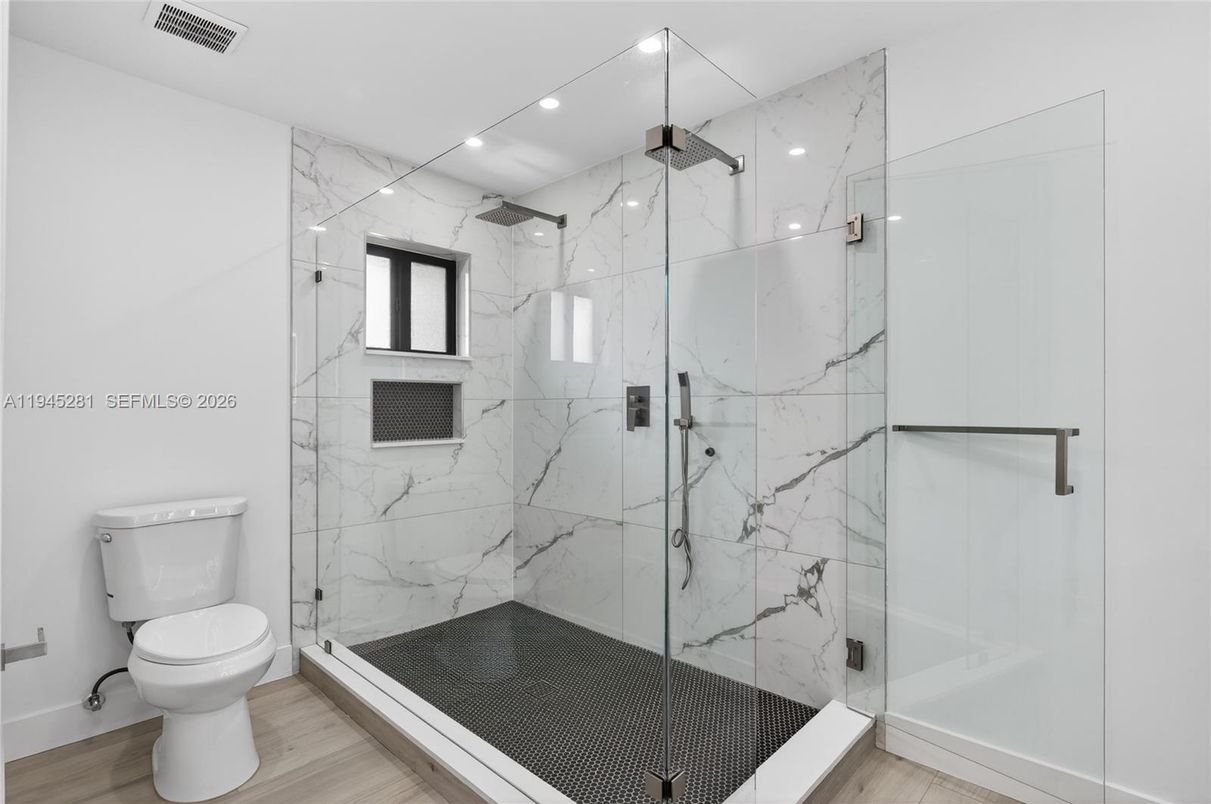 Bathroom, Glass Shower, Interior, Marble Walls, Recessed Lighting, Wood Texture Flooring