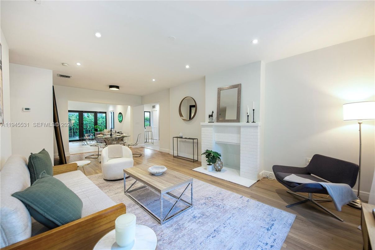 Dining room, Fireplace, Interior, Living room, Recessed Lighting, Wood Texture Flooring
