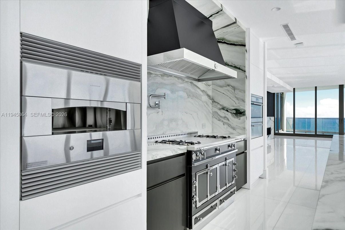 Interior, Kitchen, Marble Walls, Stainless Steel Appliances, Water